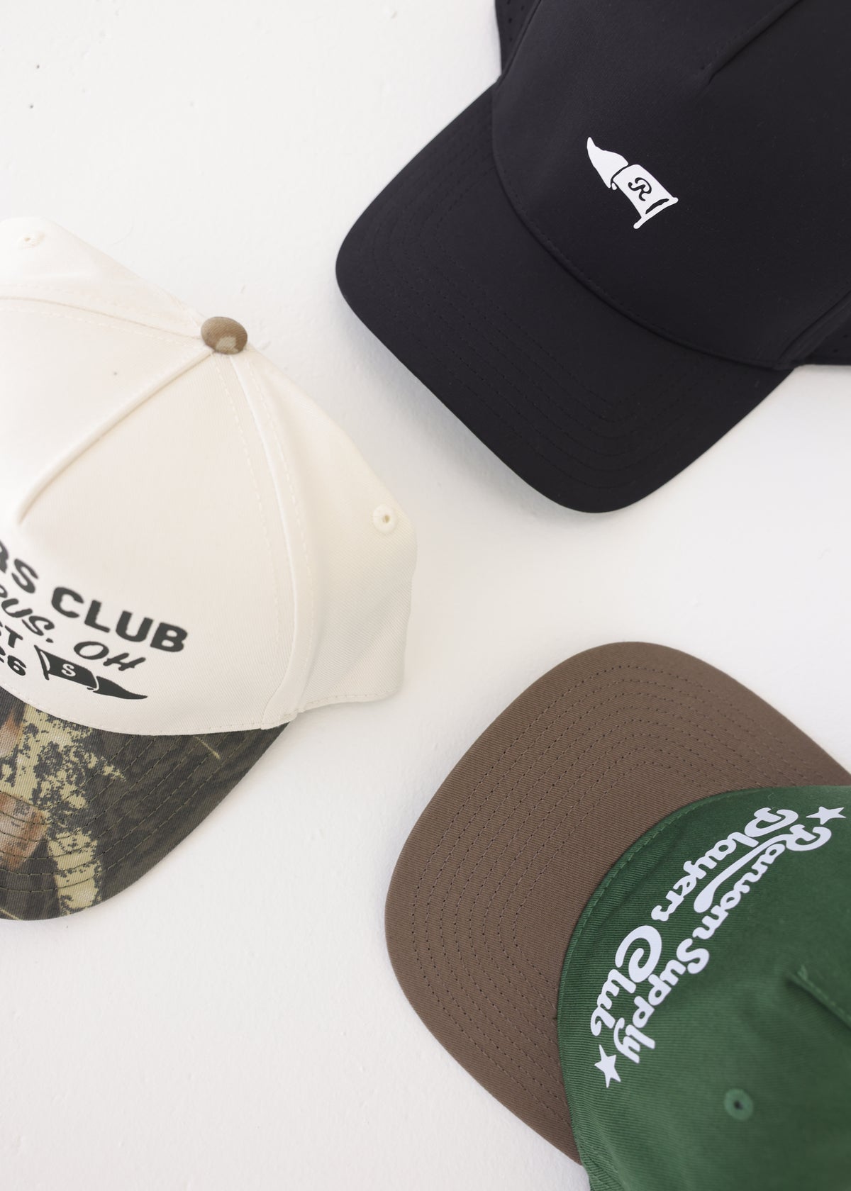 Players Club hats by Ransom Supply, flat lay