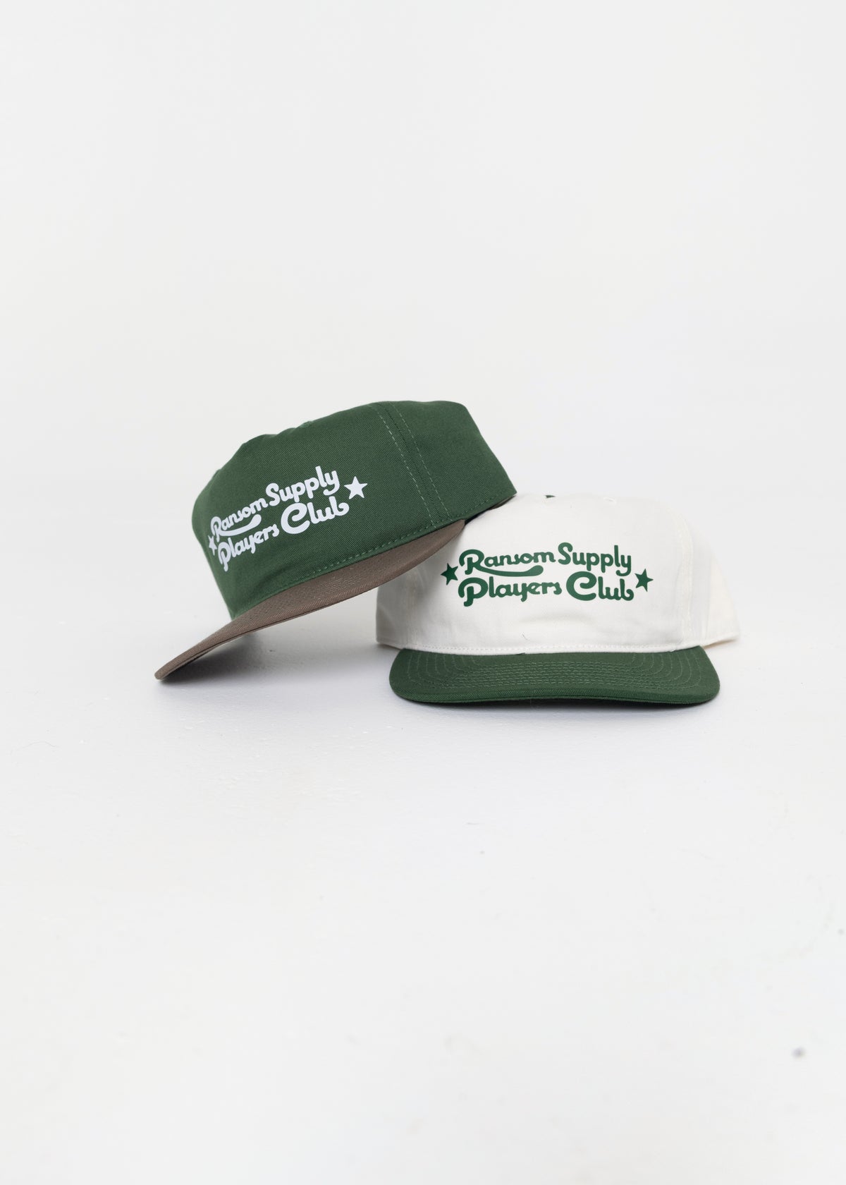 Players Club script hats in forest/walnut and white/green by Ransom Supply